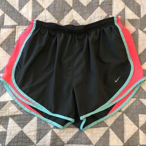 Dark grey and pink nike shorts
